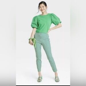 Women's High-Rise Slim Fit Ankle Pants by A New Day in a beautiful green color.